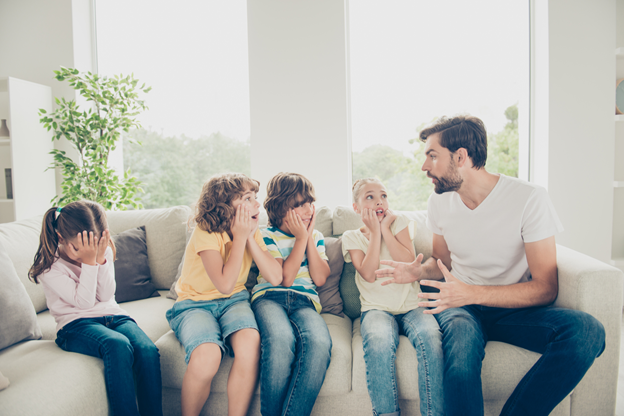 A father telling a story to his kids, working on his storytelling