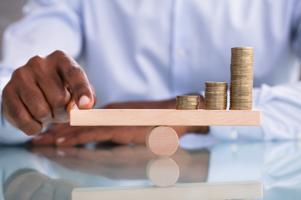 Man balancing money